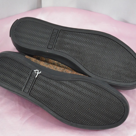 Guess Shoes Guess Gold And Black Tennis Shoes With Emblem 75 Poshmark